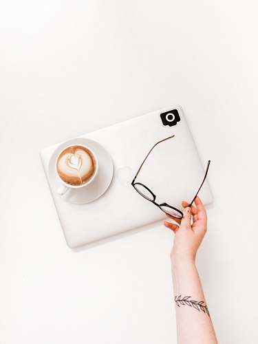 cup black framed eyeglasses text